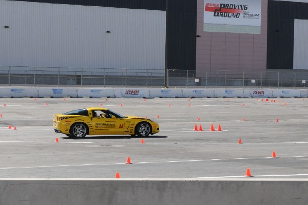 Bob Bondurant instructors take SEMA participants around SEMA MotorTrend Pro