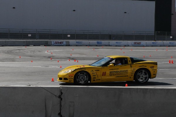 Bob Bondurant instructors take SEMA participants around SEMA MotorTrend Pro