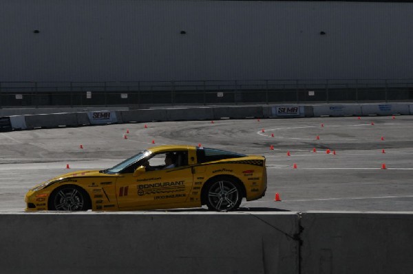 Bob Bondurant instructors take SEMA participants around SEMA MotorTrend Pro