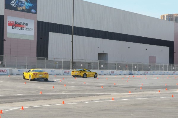 Bob Bondurant instructors take SEMA participants around SEMA MotorTrend Pro