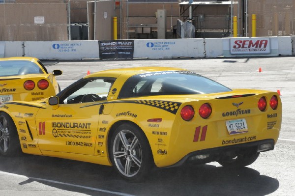 Bob Bondurant instructors take SEMA participants around SEMA MotorTrend Pro