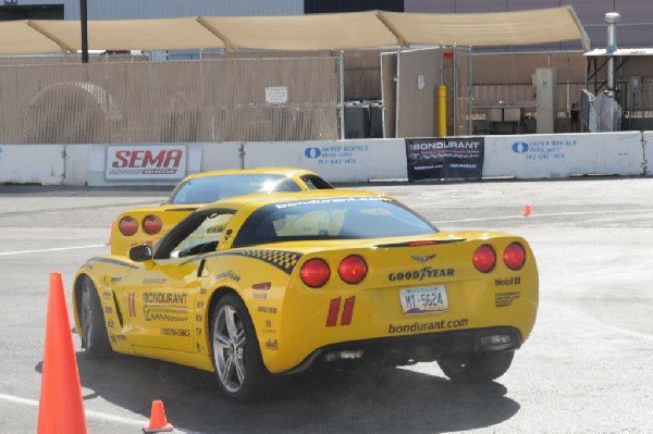 Bob Bondurant instructors take SEMA participants around SEMA MotorTrend Pro