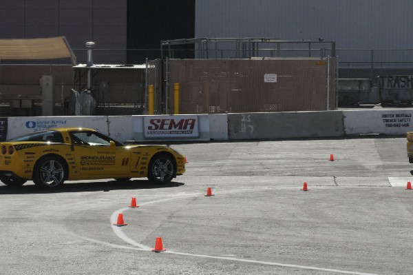 Bob Bondurant instructors take SEMA participants around SEMA MotorTrend Pro